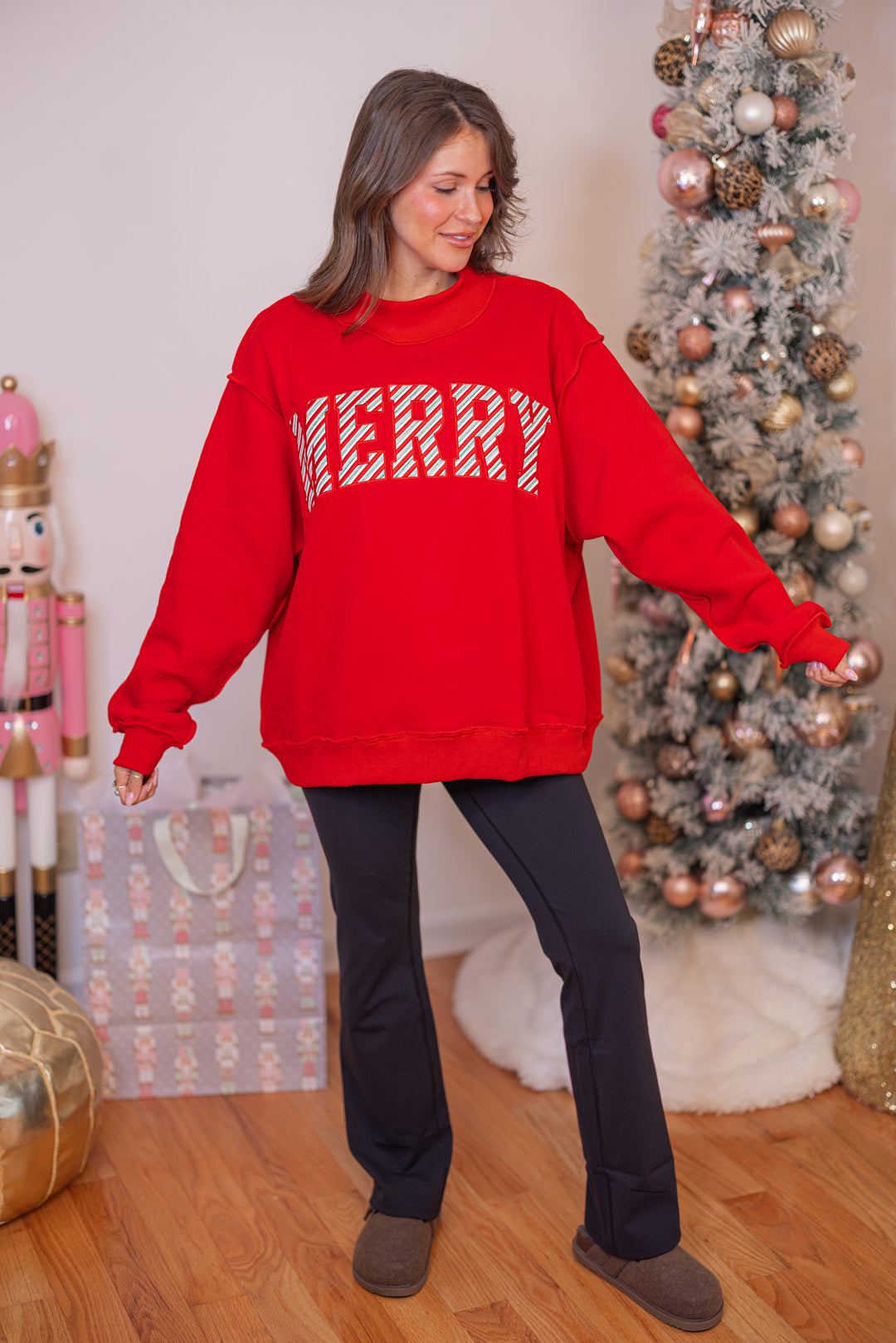Merry red embroidered Christmas sweatshirt by Bucketlist showing full front view
