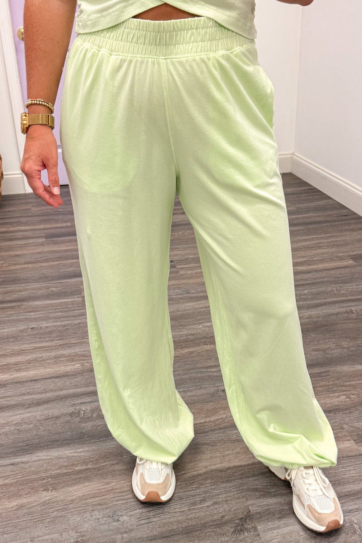 solid mint green sleeveless top and wide leg jogger pants matching athleisure set