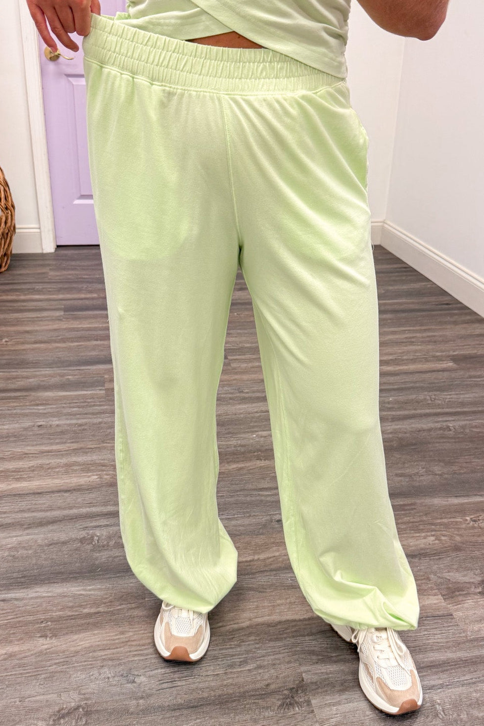 solid mint green sleeveless top and elastic waist jogger pants matching athleisure set