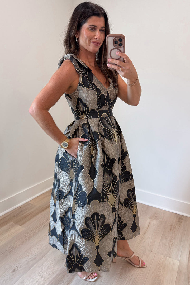 light mocha and black floral print with gold metallic accents sleeveless midi dress with side pockets