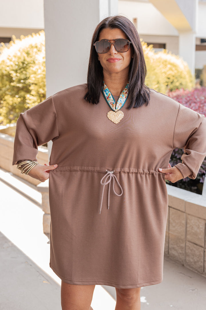 Women's mocha brown scuba knit dress by Jodifl showing self adjustable cinch waistband stretch