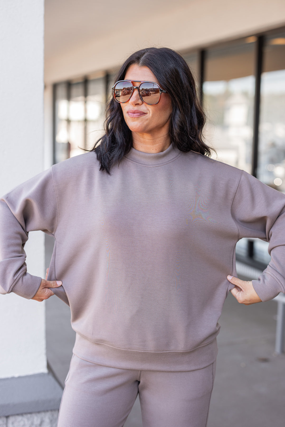 Mocha scuba knit mock neck pullover top by Rae Mode showing true to size fit