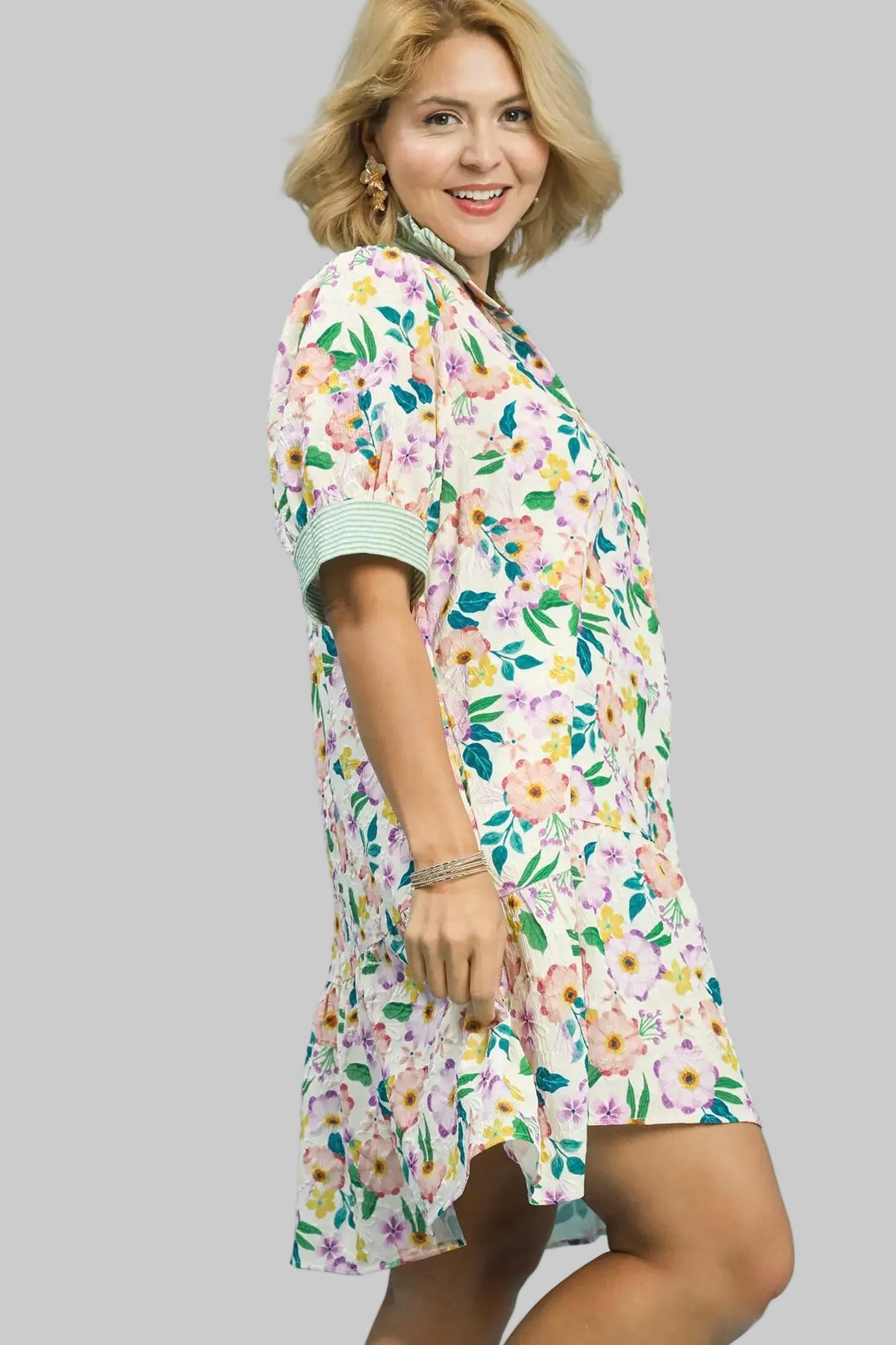 Women's Umgee shorts floral print textured dress with green striped trim in plus size showing the side view