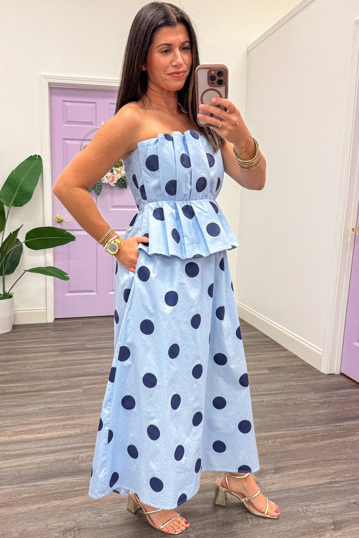 light blue with large navy polka dot print peplum strapless midi dress with side pockets