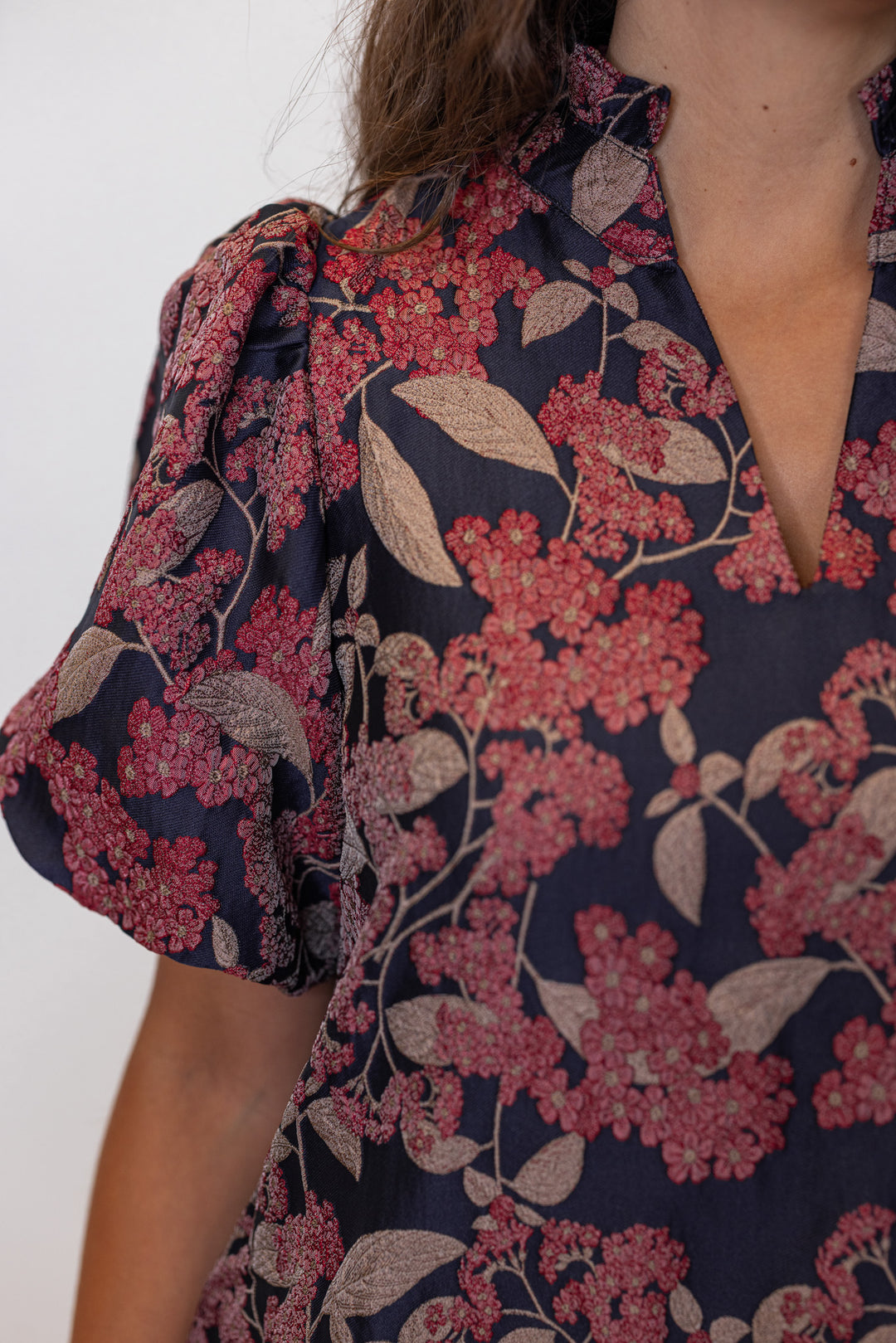 Floral patterned dress with a deep neckline 