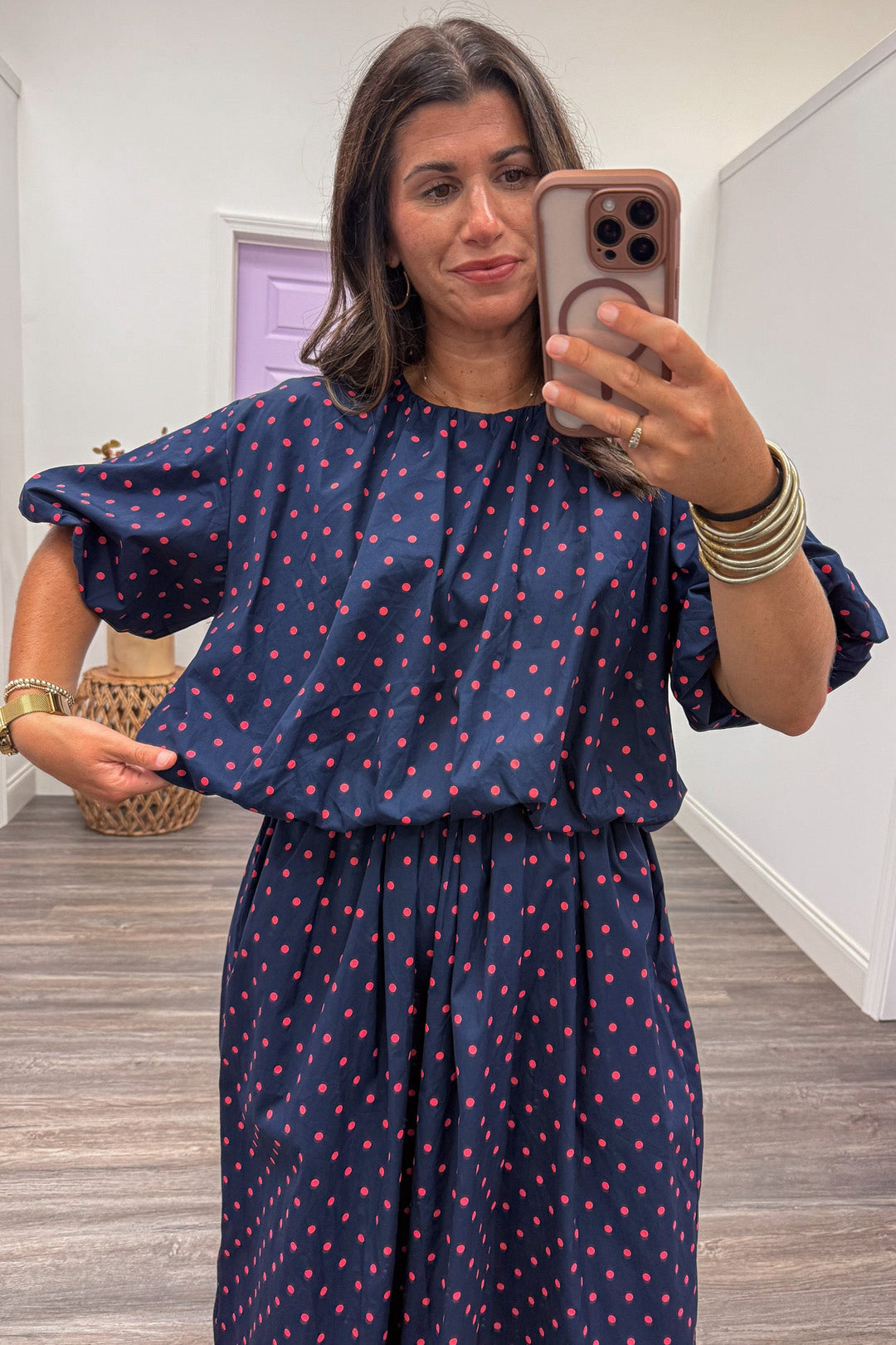navy blue with coral polka dot print puff sleeve bubble hem relaxed silhouette cotton top