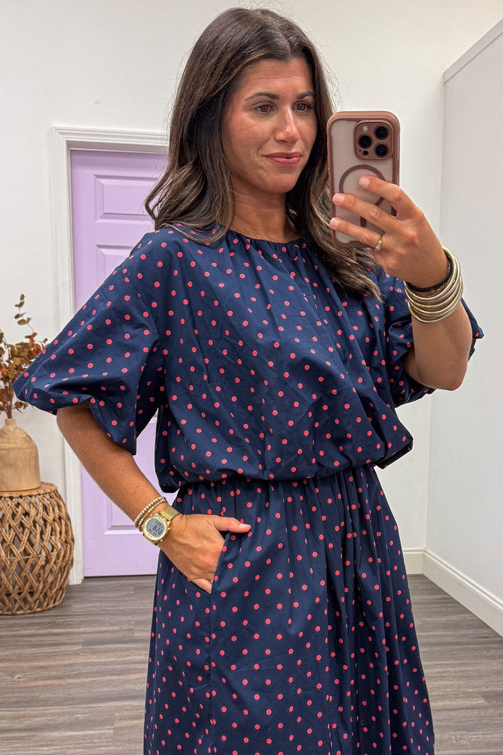 navy blue with coral polka dot print puff sleeve crew neckline bubble hem cotton top