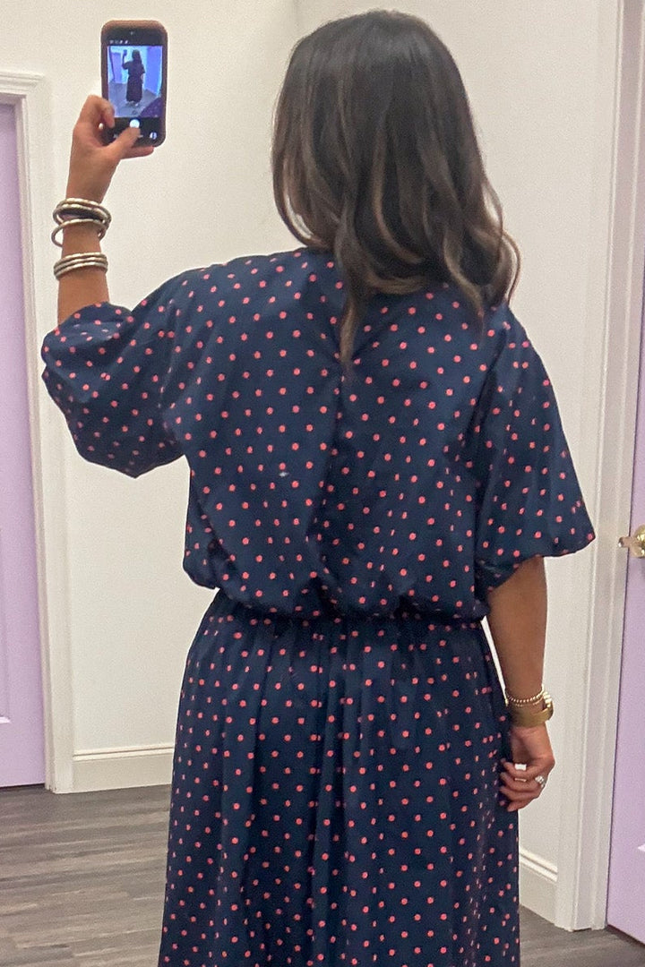 navy blue with coral polka dot print puff sleeve bubble hem cotton top with keyhole button closure