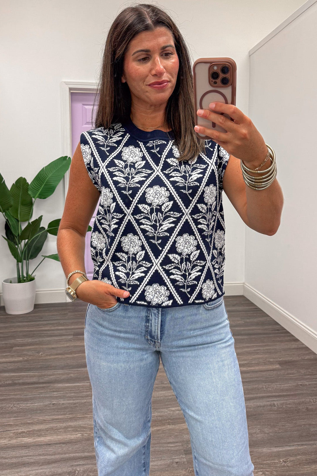 navy with cream diamond floral print crew neckline sleeveless lightweight knit top