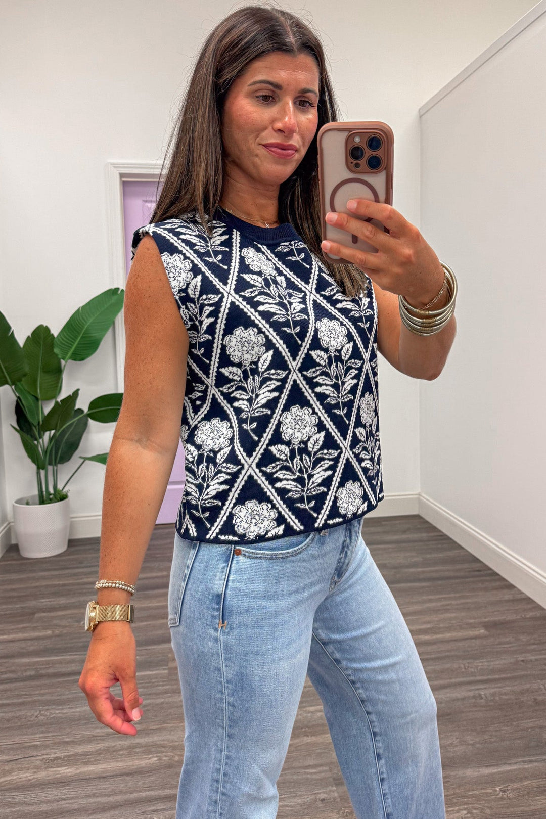 navy blue with cream diamond floral print crew neckline sleeveless knit top