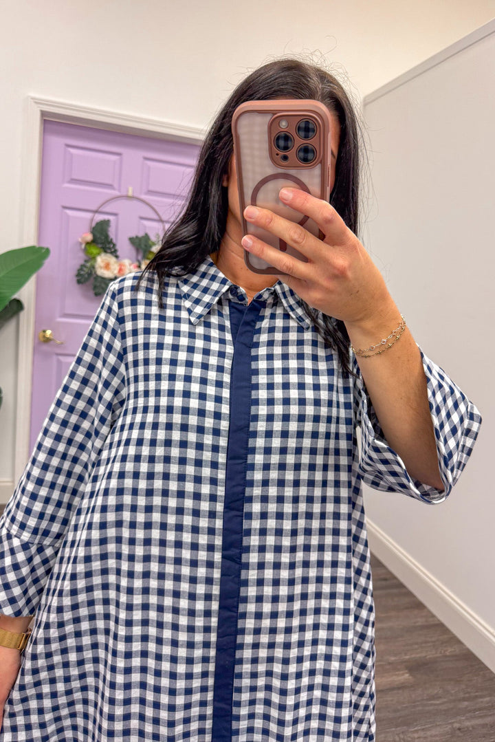 Close up of navy gingham loose maxi dress