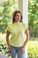 lime mock neck short sleeve sweater