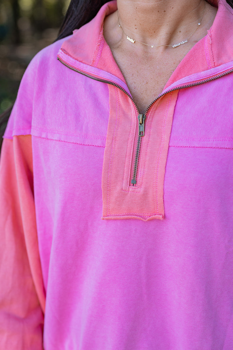 neon pink coral quarter zip pullover