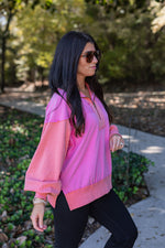 neon pink coral quarter zip pullover