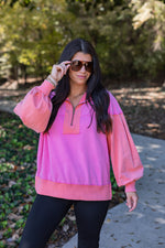 neon pink coral quarter zip pullover