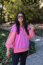 neon pink coral quarter zip pullover