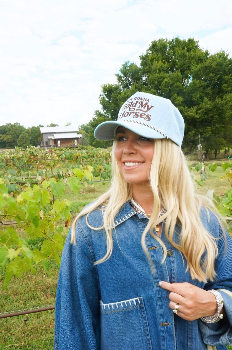 not gonna hold my horses denim and brown trucker hat