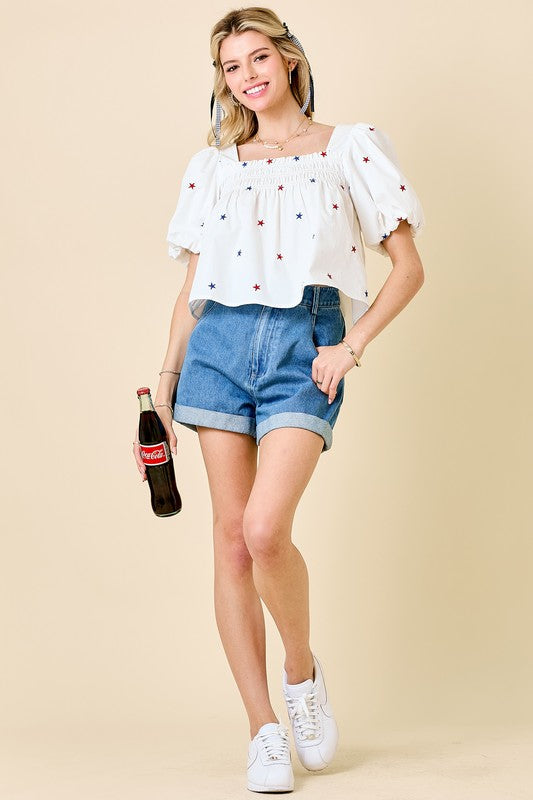 Day + Moon Off white poplin babydoll top with red and blue embroidered stars