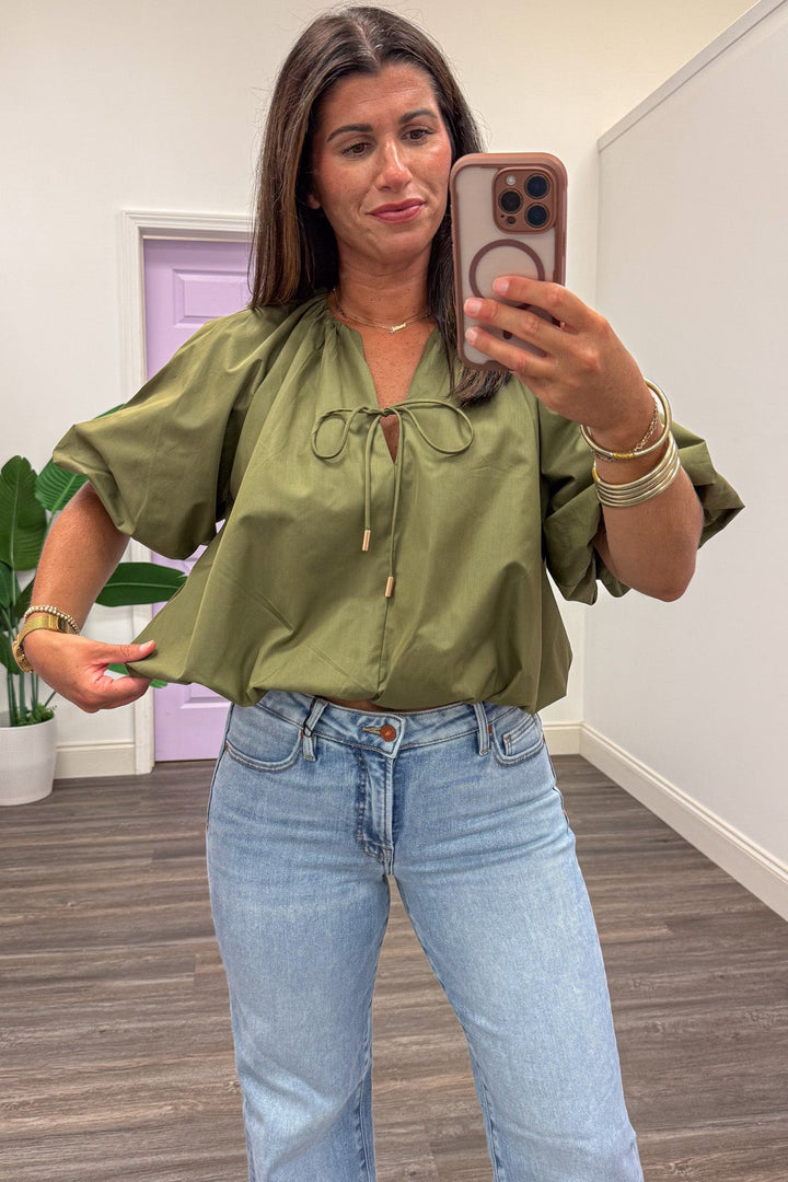 solid olive green self-tie v neckline bubble hem semi-cropped relaxed silhouette top