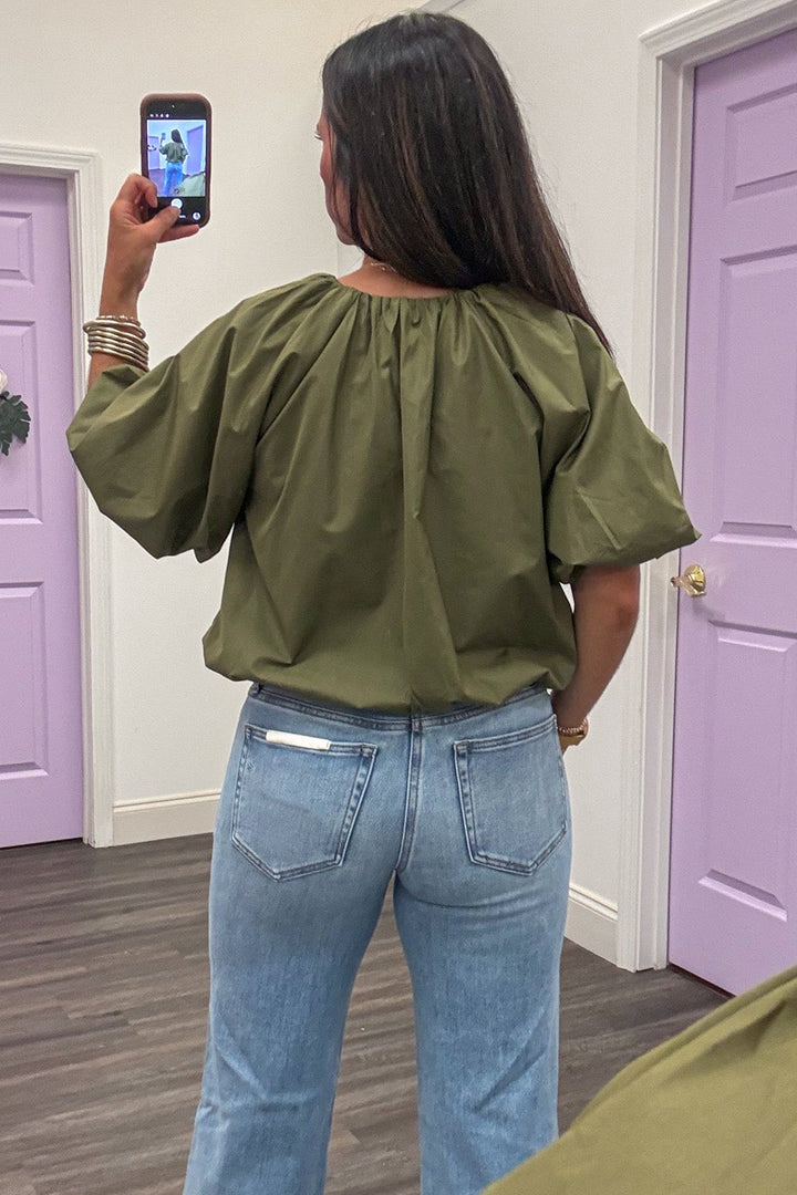solid olive green self-tie v neckline bubble bottom hem semi-cropped top