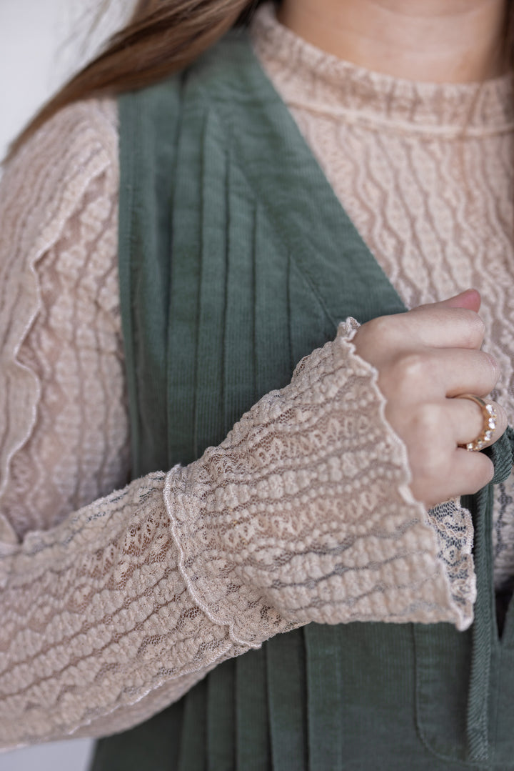 Women's olive green corduroy romper with bow tie v neck by Wishlist showing ruched bodice