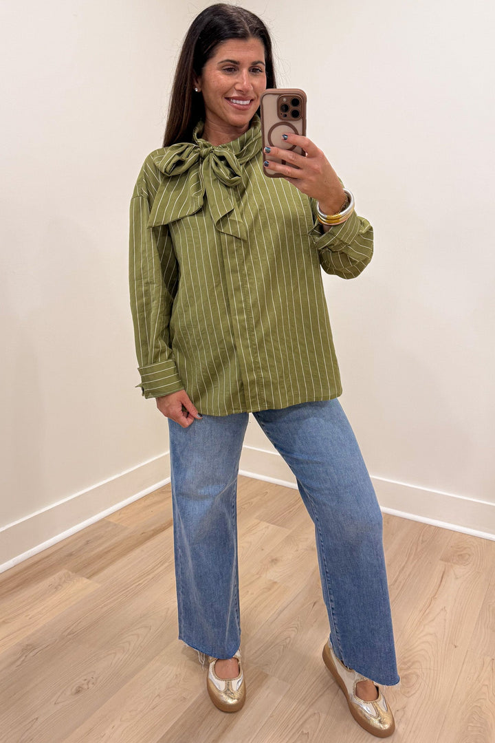 olive green and cream striped bow tie mock neck long sleeve flap covered button front top