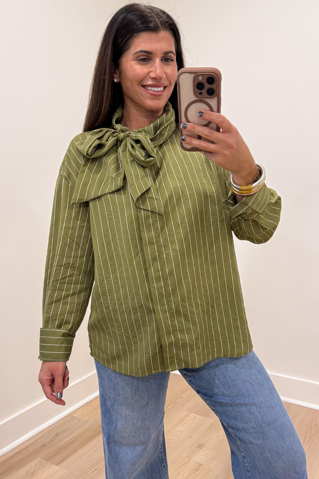 olive green and cream striped mock neck long sleeve flap covered button front top