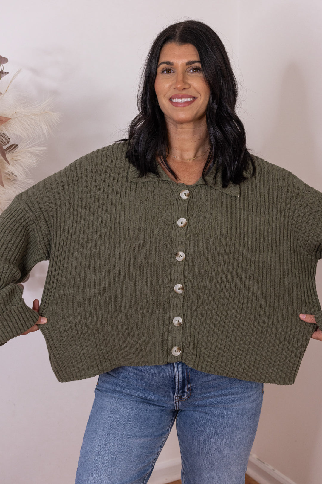 Women's olive button front sweater knit cardigan with a collar by She & Sky showing true to size fit