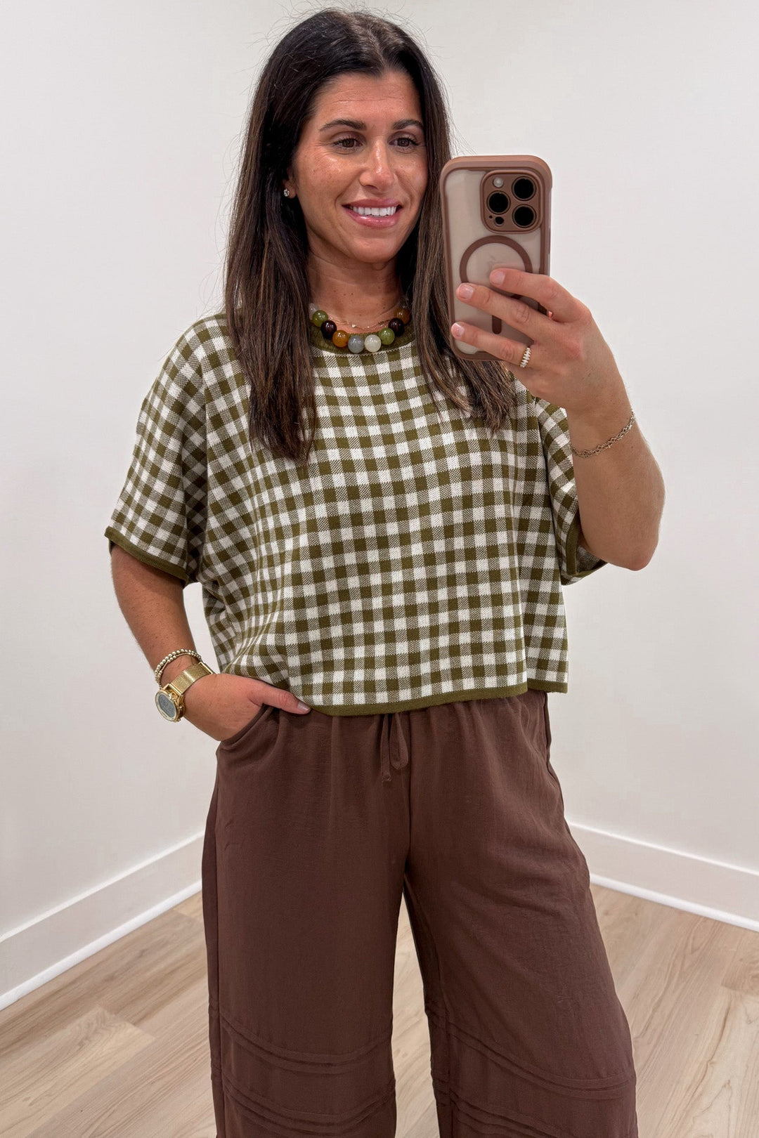 olive green and ivory gingham checkered print short sleeve semi-cropped knit top