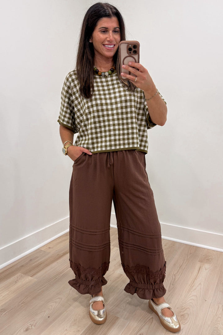 olive green and ivory gingham checkered print crew neckline short sleeve semi-cropped knit top