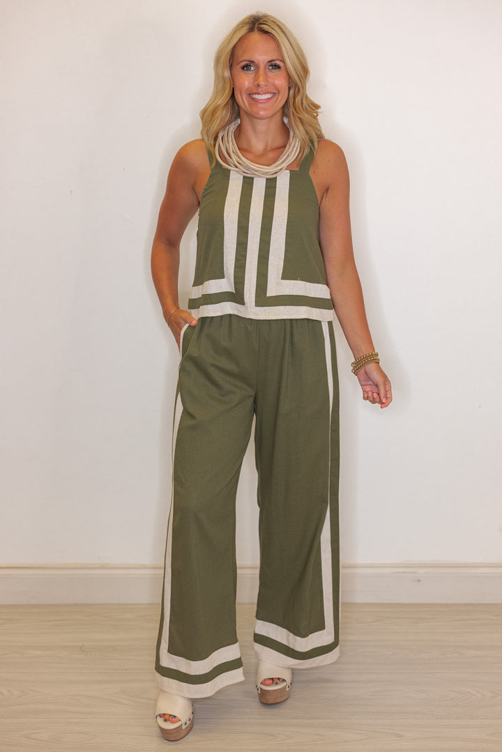 Women's olive green elastic waist linen pants with oatmeal trim throughout by Entro