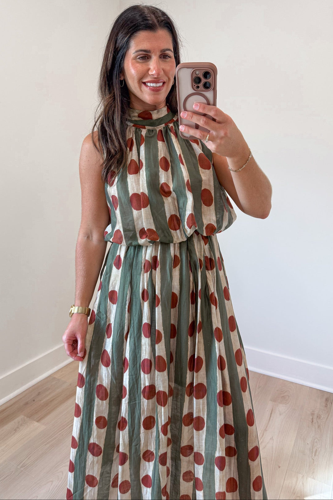 olive green and ecru stripes with rust polka dot print sleeveless mock neck midi dress