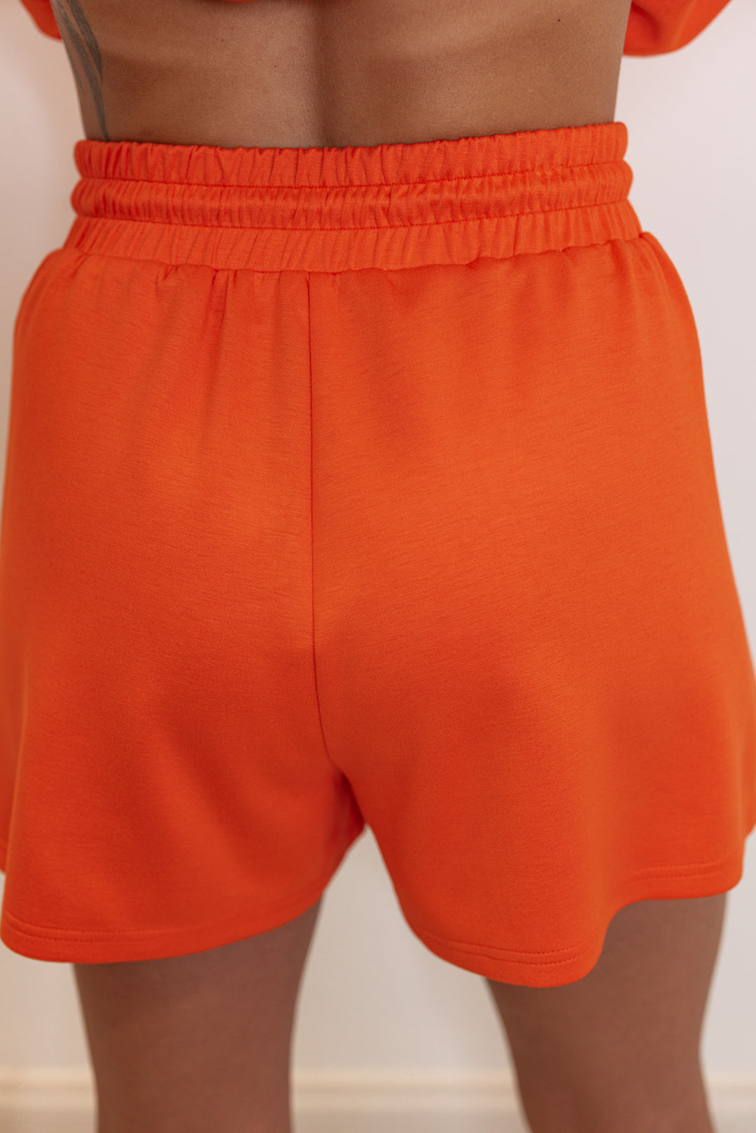 orange elastic waist lounge shorts