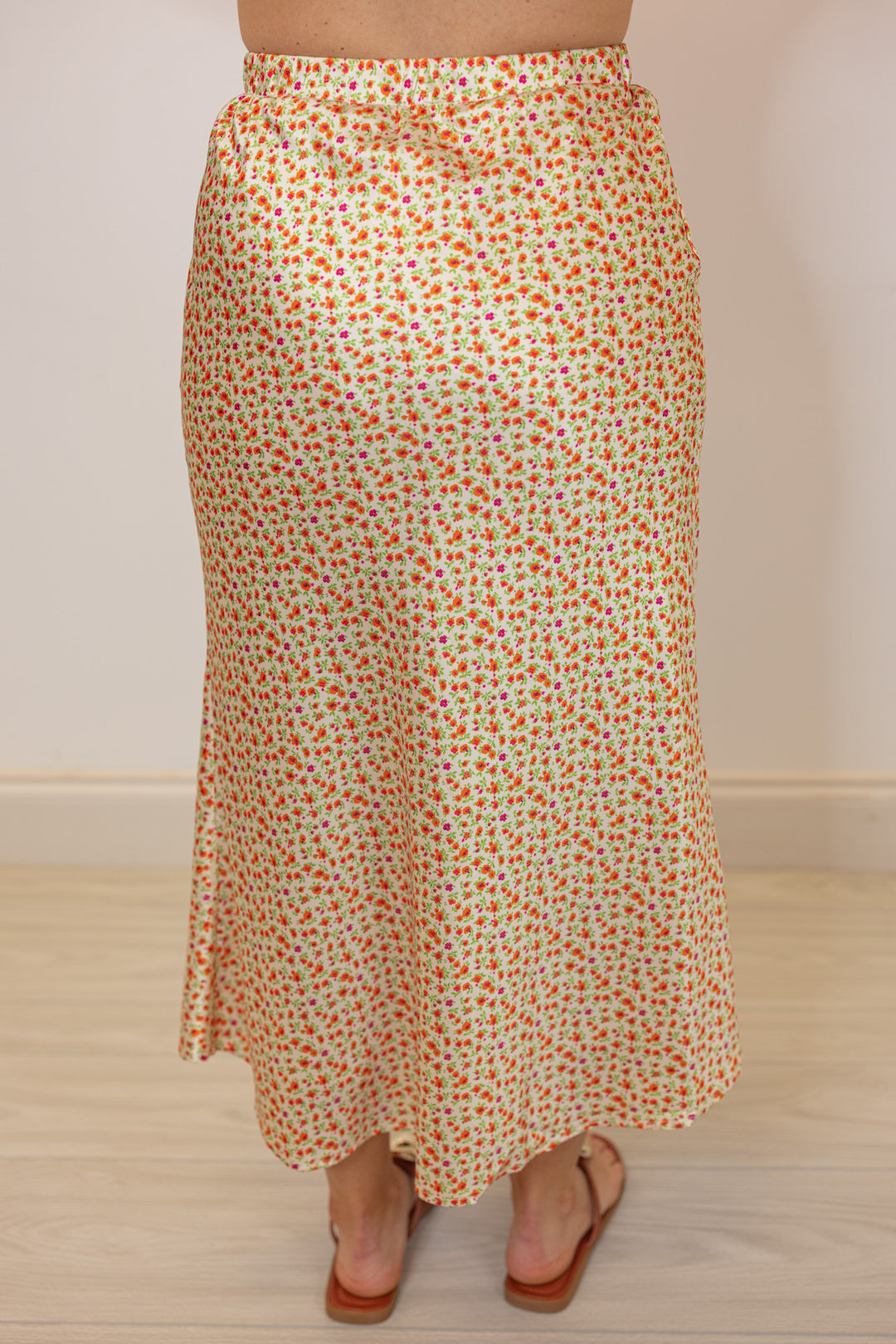 orange yellow floral satin midi skirt