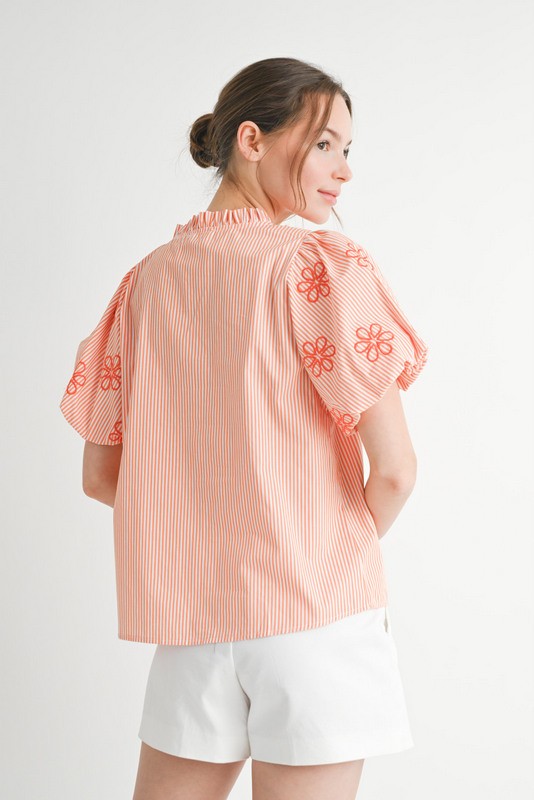 Jodifl Orange and cream striped top with floral accents and bow tie front closure