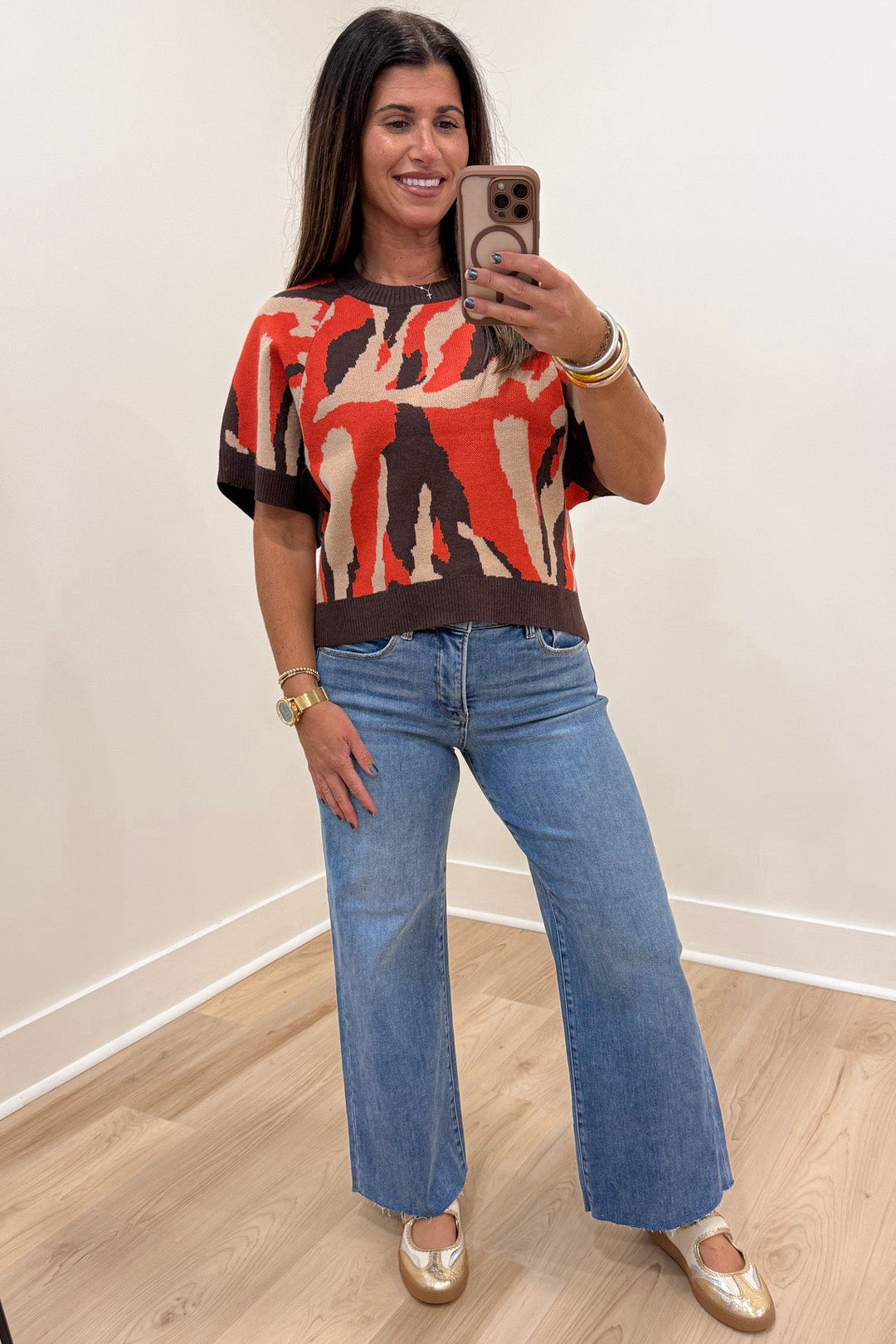 orange taupe and brown animal print crew neckline short sleeve semi-cropped knit sweater top