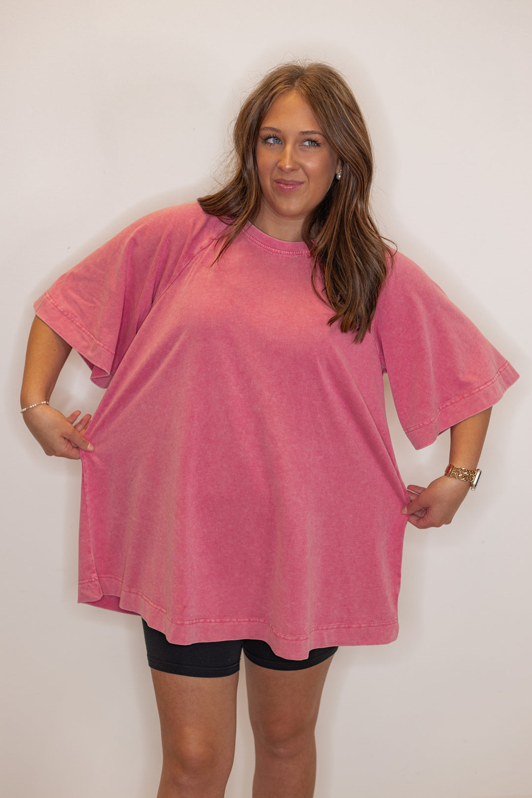 Women's oversized cotton pink tee shirt, showing oversized fit