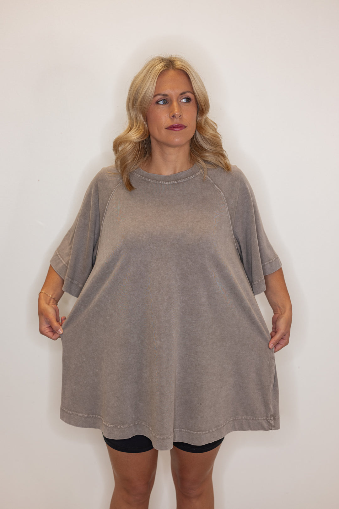 Women's oversized mineral washed brown cotton tee shirt, showing over sized fit