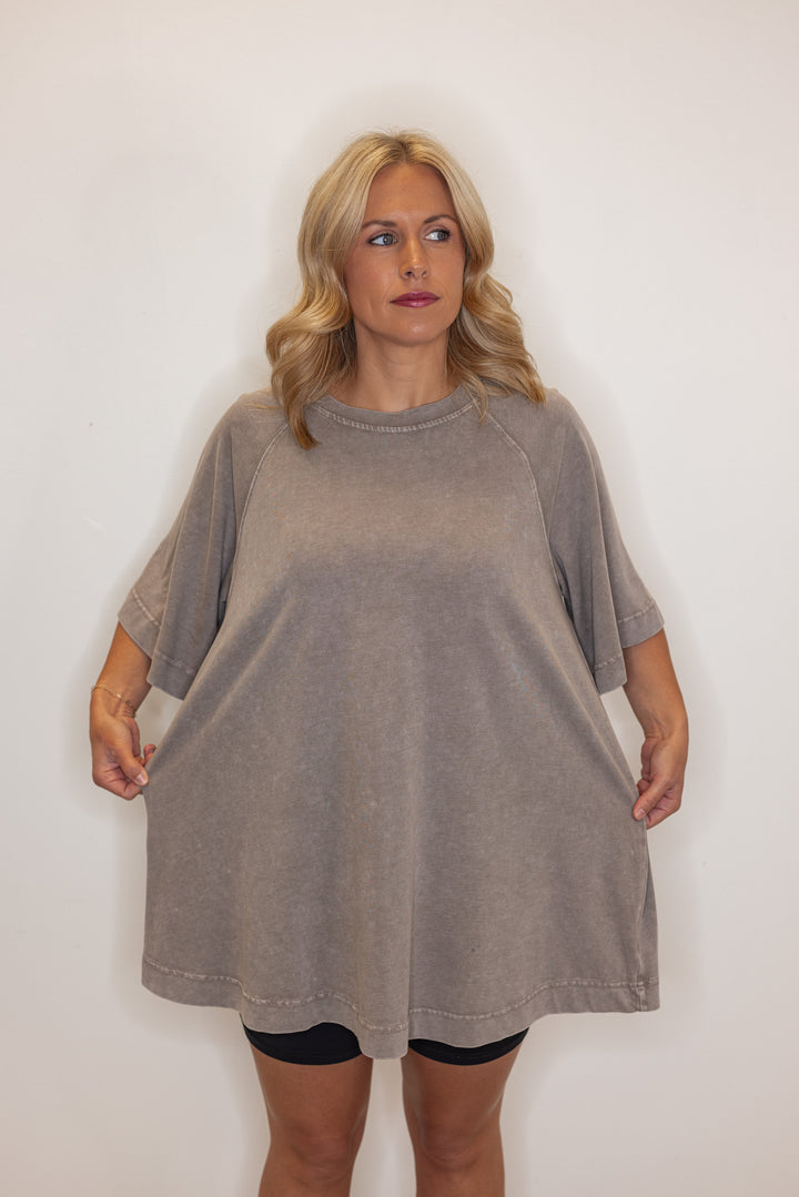 Women's oversized mineral washed brown cotton tee shirt, showing over sized fit