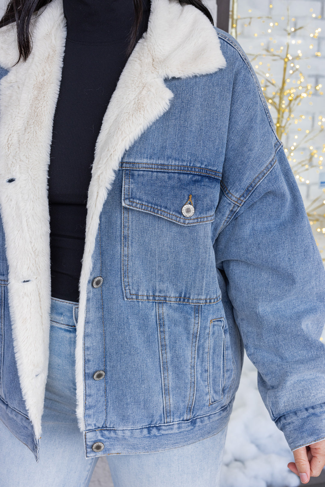 Blue denim jacket with cream faux fur lining by Wishlist showing drop shoulder