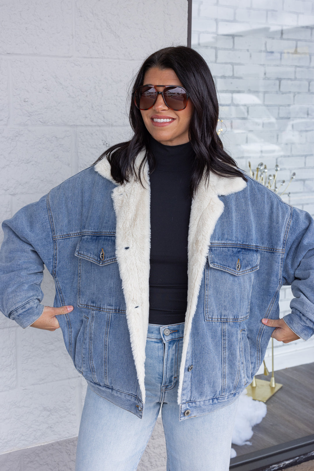 Blue denim jacket with cream faux fur lining by Wishlist showing relaxed fit