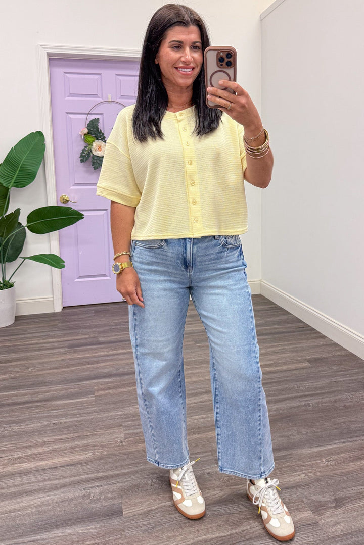 solid pale butter yellow button front crew neckline cardigan top