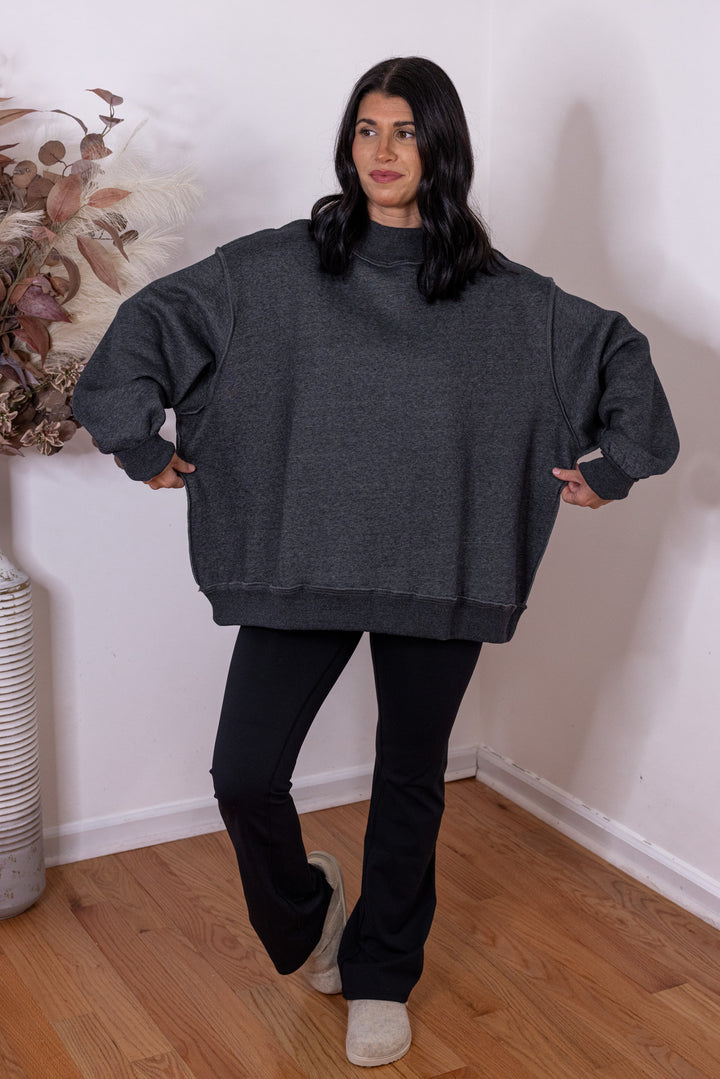 Women's charcoal reversible mock neck sweatshirt by Bucketlist showing full view of oversized fit