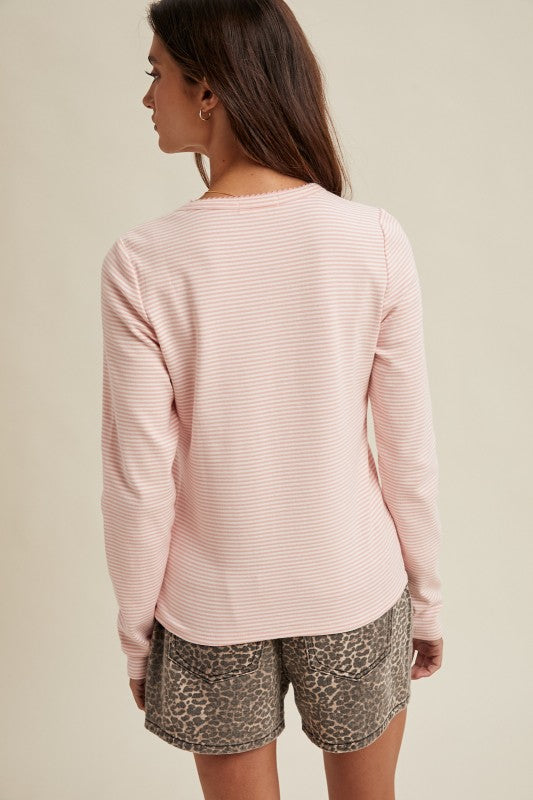 Women's pink and white striped knit long sleeve top by Wishlist showing back view