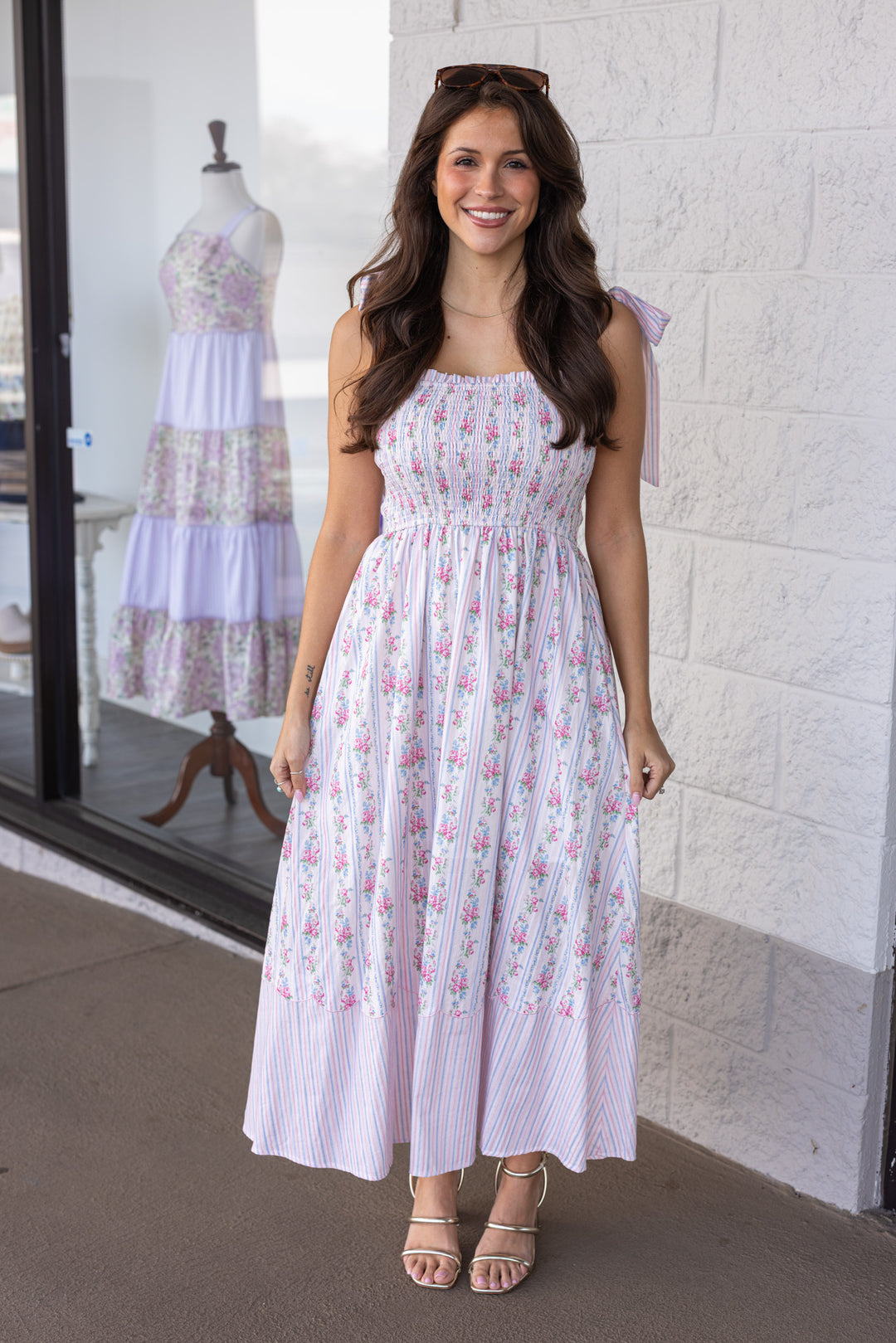pink and blue floral and striped print sleeveless midi dress