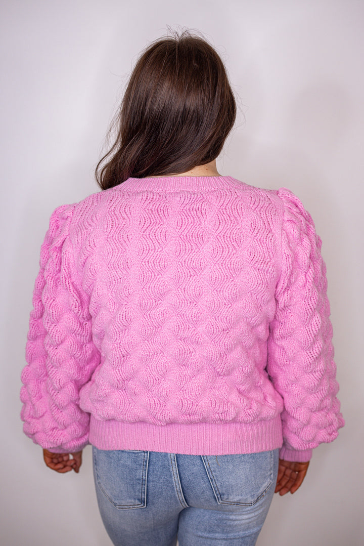 pink bubble textured knit sweater