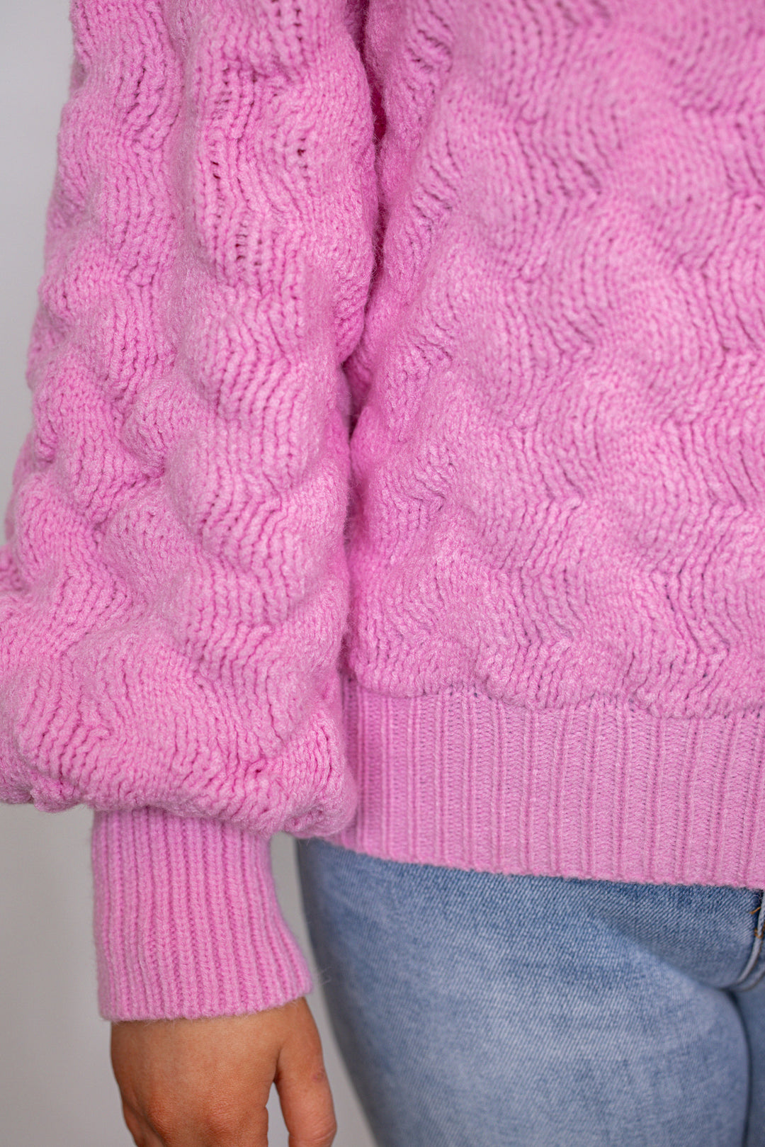 pink bubble textured knit sweater