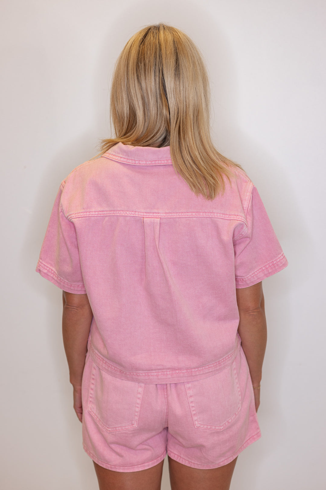 Bubblegum pink washed denim top with collar by Wishlist showing back view