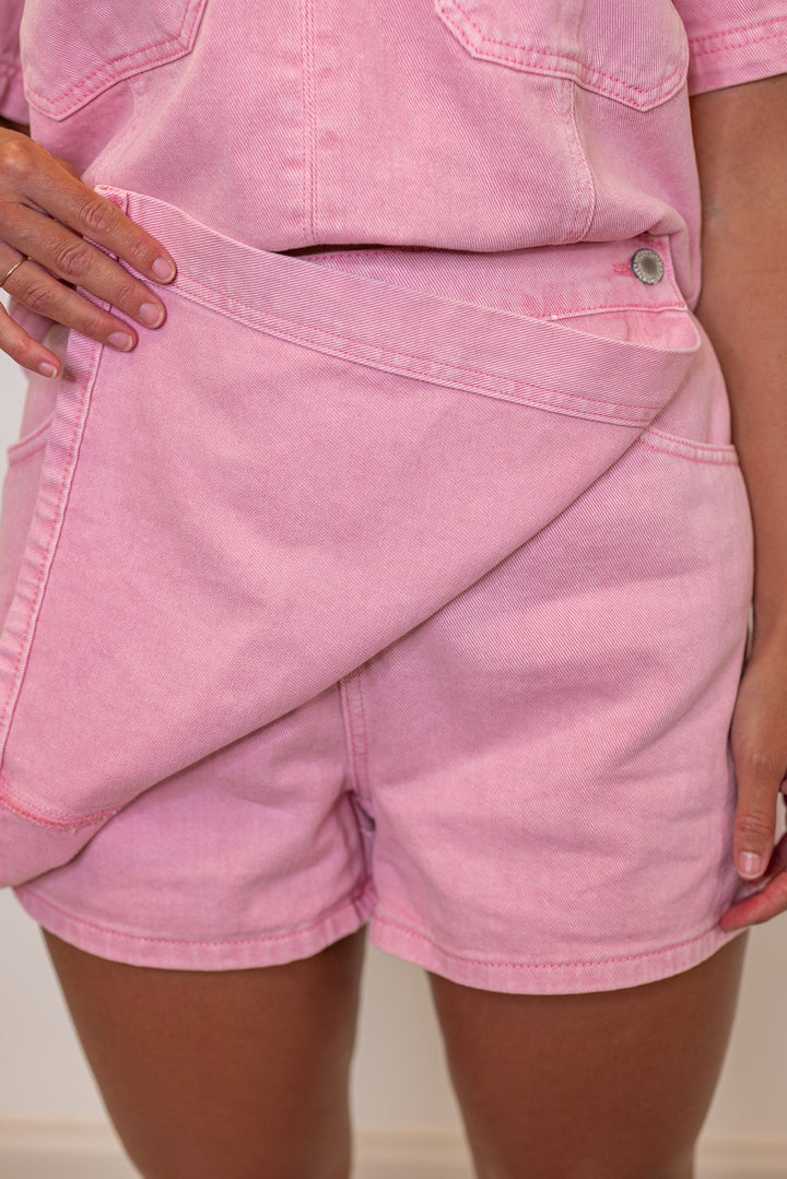 Bubblegum pink washed denim skort with wrap around style front by Wishlist showing inner shorts