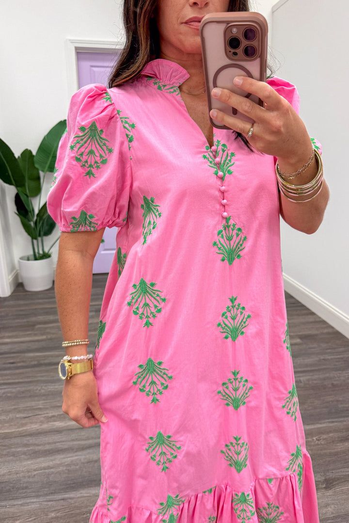 pink with green embroidered flowers ruffle trimmed v neckline midi dress